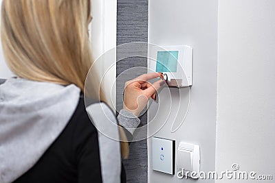 Smart Home Comfort: Regulating Room Temperature with Ease Stock Photo