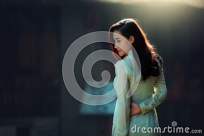 Young Beautiful woman in Ao Dai Vietnam Stock Photo