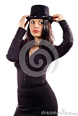 Young beautiful woman in black tophat Stock Photo