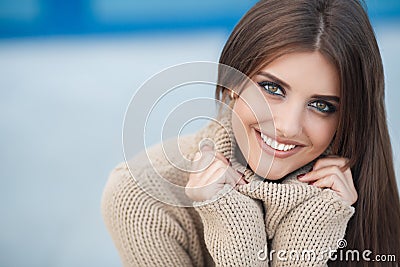 Spring portrait of a beautiful woman in the city outdoors Stock Photo