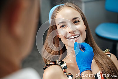 Young beautiful woman at the dental clinic at the doctorâ€™s appointment Stock Photo