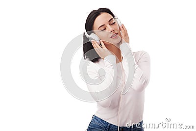 Young beautiful woman enjoying with listening the music in big h Stock Photo
