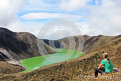 Young beautiful woman enjoys the view at Laguna Verde lake in Narino, Colombia Stock Photo