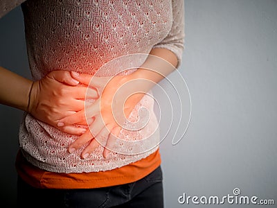 Young beautiful woman having painful stomachache.Chronic gastritis. Stock Photo