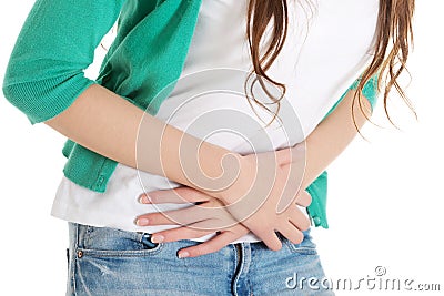 Young beautiful woman is having stomach ache. Stock Photo