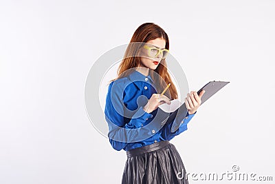 Young beautiful woman holding documents on white background Stock Photo