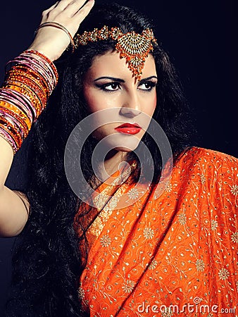 Young beautiful woman in indian traditional sari Stock Photo