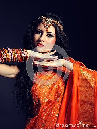 Young beautiful woman in indian traditional sari Stock Photo