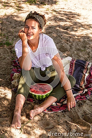 Beautiful woman eat waretmelon Stock Photo