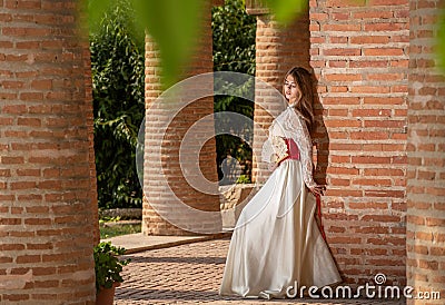 Young beautiful woman with medieval dress , romantic mood with white lace dress and fan Editorial Stock Photo