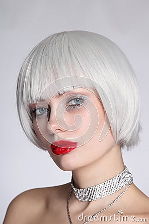 Young beautiful woman in platinum blonde wig Stock Photo