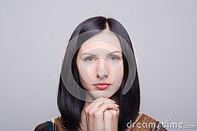 Young beautiful woman prays Stock Photo