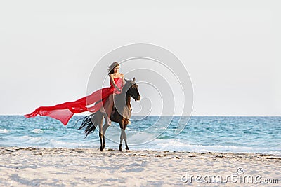 Young beautiful woman in red dress Stock Photo