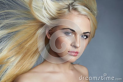 Young beautiful woman. blond girl. Beauty salon.Haircare Stock Photo