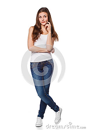 Young beautiful woman thinking looking to the side at blank copy space, full length, isolated over white background Stock Photo