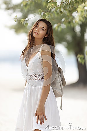 Young Woman on the Beach in Summer Stock Photo