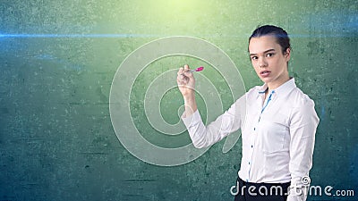 Young beautiful woman in white skirt with pen writing on the screen. Business concept with copyspace.Isolated background Stock Photo