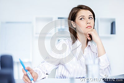 Young beautiful young business woman at office Stock Photo