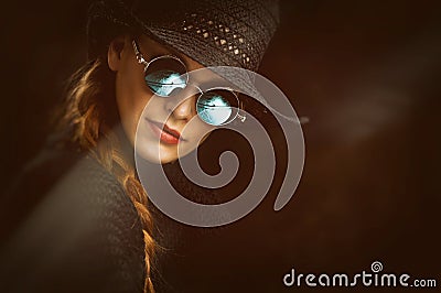 Young beauty woman in steampunk round glasses Stock Photo