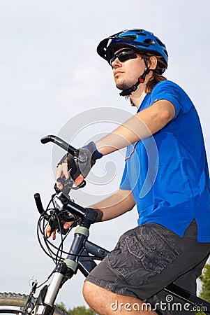 Young bicyclist in helmet Stock Photo