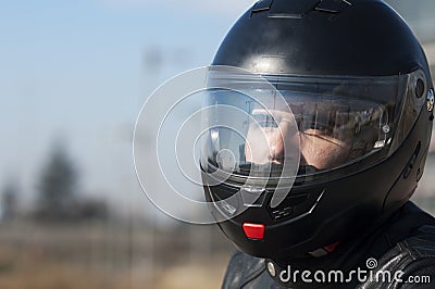 Young biker with helmet Stock Photo