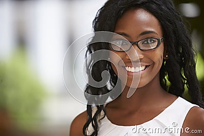 Young black businesswoman wearing glasses, close up Stock Photo