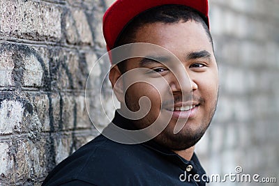 Young black guy in red cap Stock Photo
