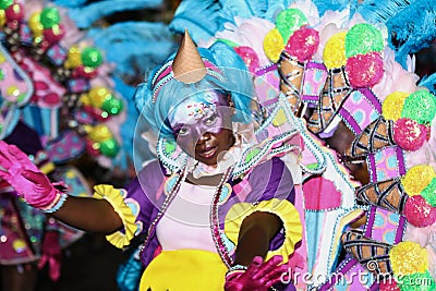 Young black woman dressed in colorful costume at Junkanoo Editorial Stock Photo