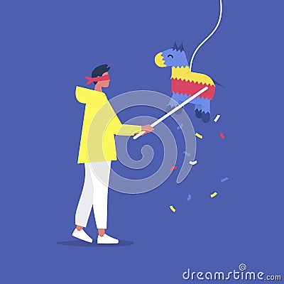 Young blindfolded character hitting a colourful pinata with a stick, celebration party Stock Photo