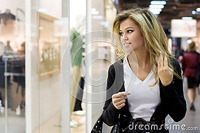 Young blond woman shopping Stock Photo