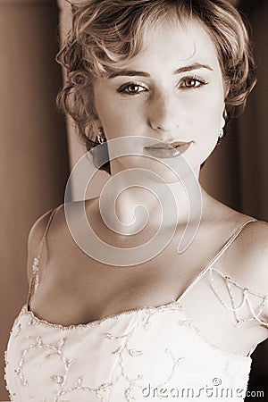 Young blonde bride in white Stock Photo