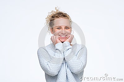 Young blonde curly laughing woman having positive mood. Stock Photo