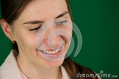 Young blonde white woman laughing while posing at camera indoors Stock Photo