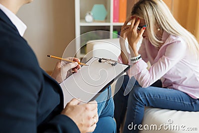 Young woman visiting psychologist Stock Photo