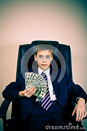 Young boss holding dollars Stock Photo