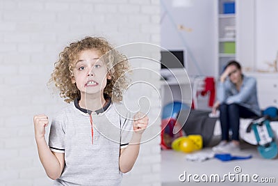 Young boy with bad mood Stock Photo