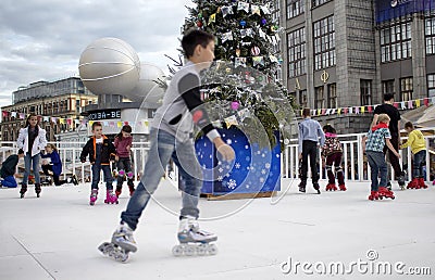 Young boy in blurry motion and children skate Editorial Stock Photo