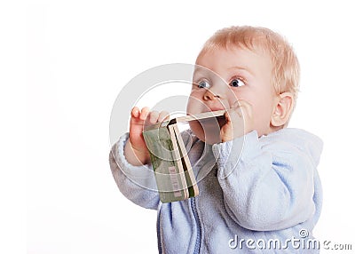 Young boy chew book Stock Photo