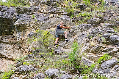 Young boy climber Stock Photo