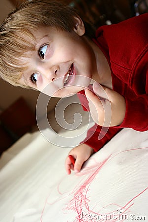 Young boy coloring Stock Photo