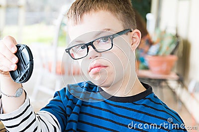 Young Boy With Downs Syndrome Stock Photo