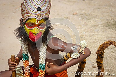 Young boy dressing as Hanuman Editorial Stock Photo