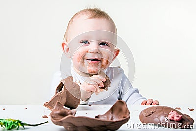 A boy eating chocolate Stock Photo