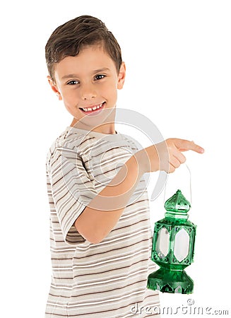 Young boy feeling happy with Ramadan lantern Stock Photo