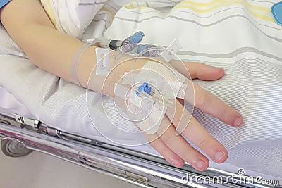 Young boy getting prepared for glucose injection Stock Photo