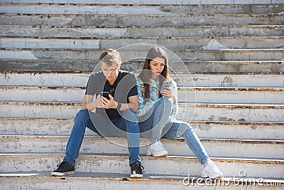 Young boy and girl deep into virtual reality. Stock Photo