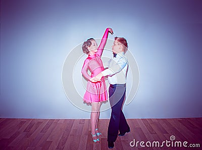 The young boy and girl posing at dance studio Stock Photo