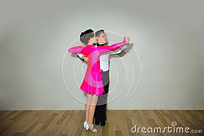 The young boy and girl posing at dance studio Stock Photo