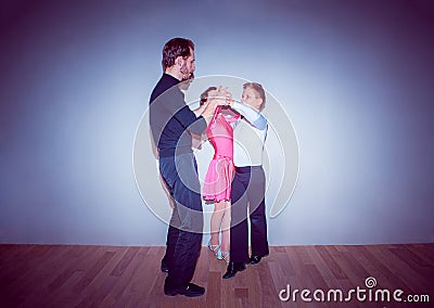 The young boy and girl posing at dance studio Stock Photo