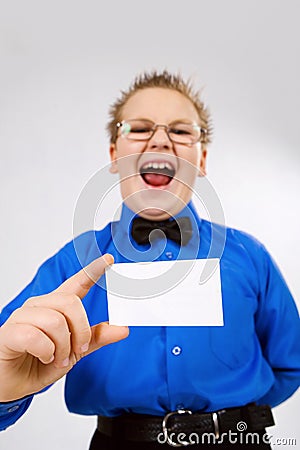 Young boy holding an empty advertising card Stock Photo